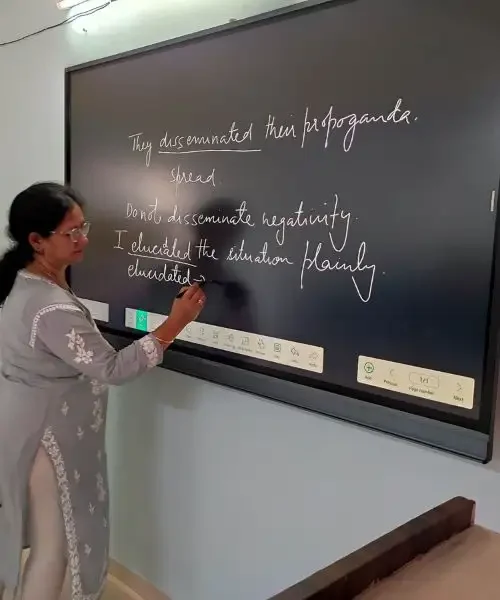 Prof.-Sonia-Nair-teaching-English-subject-using-Digital-board-qol4ahlefgxtqk3bffq5d4w53fn2fotpkvsikosqcw